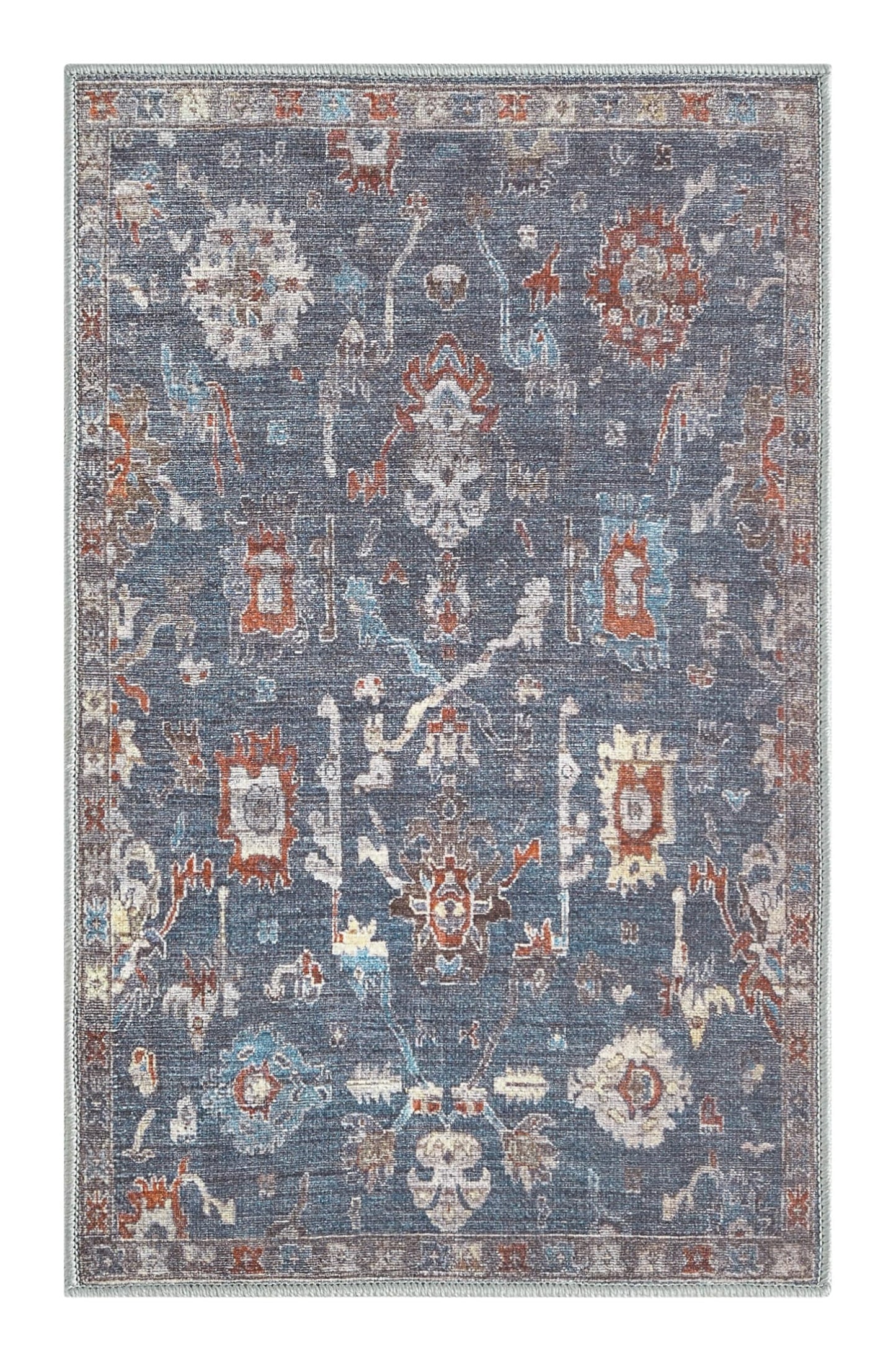 Faded Farahan rug in a refined home office with leather chair