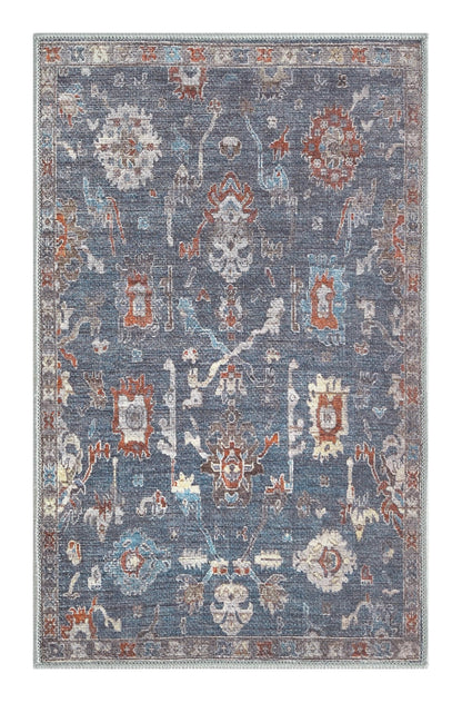Faded Farahan rug in a refined home office with leather chair