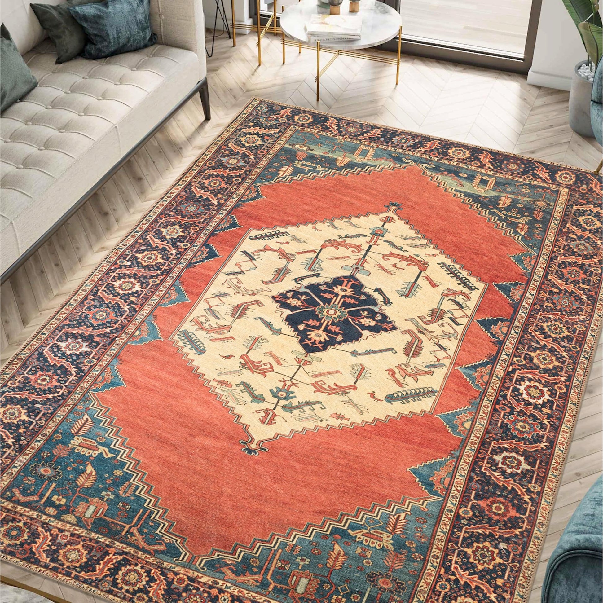 Indigo Hamadan rug styled in a warm-traditional living room