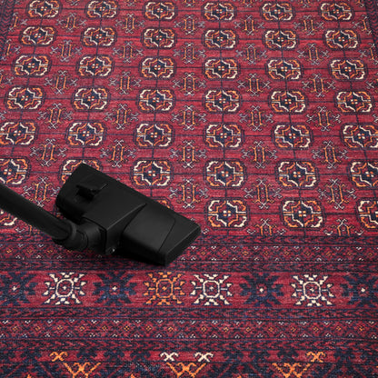 Tribal striped rug in a reading nook with leather chair