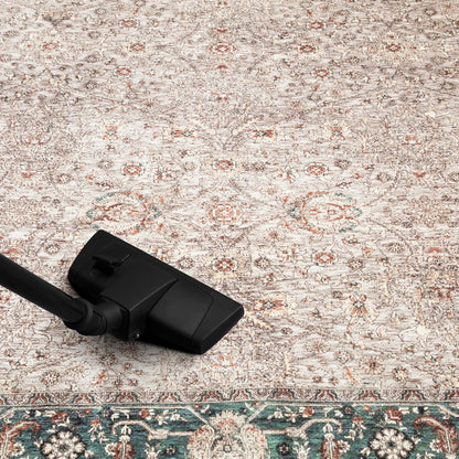 Refined Nain rug in a collected home library with leather chairs