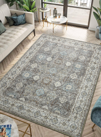 Oushak Turkish rug under a white slipcovered sofa with linen pillows