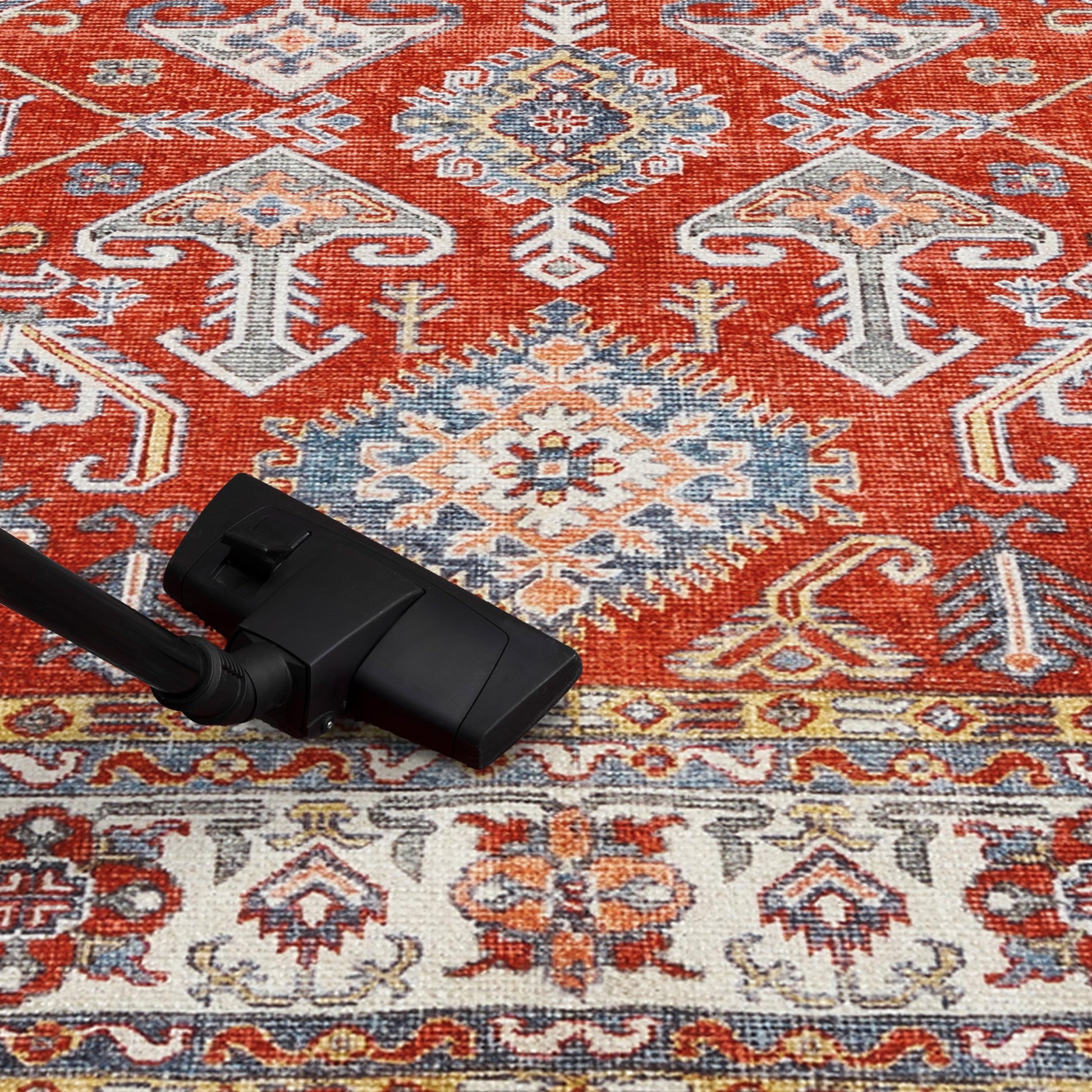 Caucasian Kazak runner styled in an entry hallway