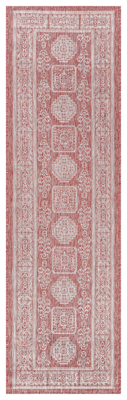 Close-up texture of the octagonal güllü medallions in Terracotta on ivory