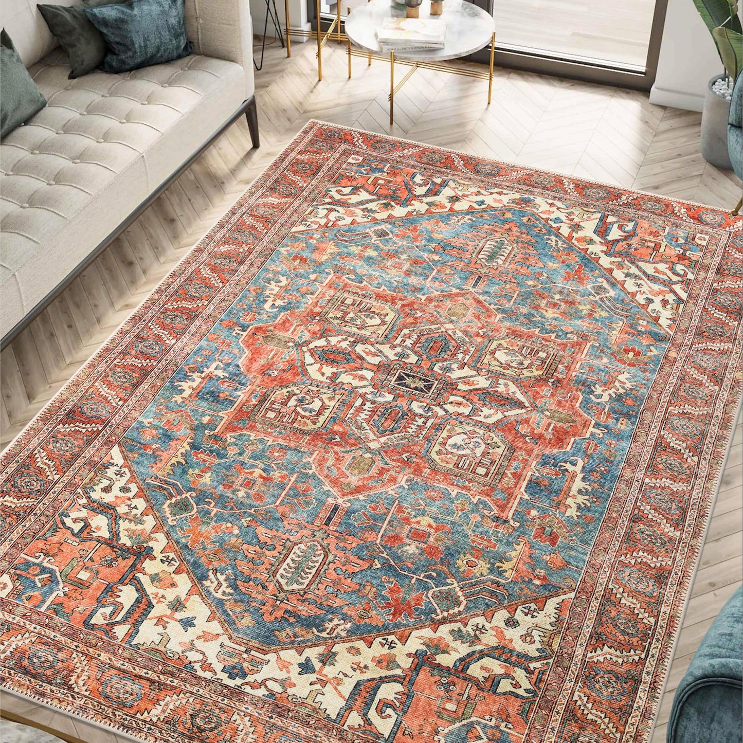 Indigo blue Heriz rug styled in a richly-collected traditional living room