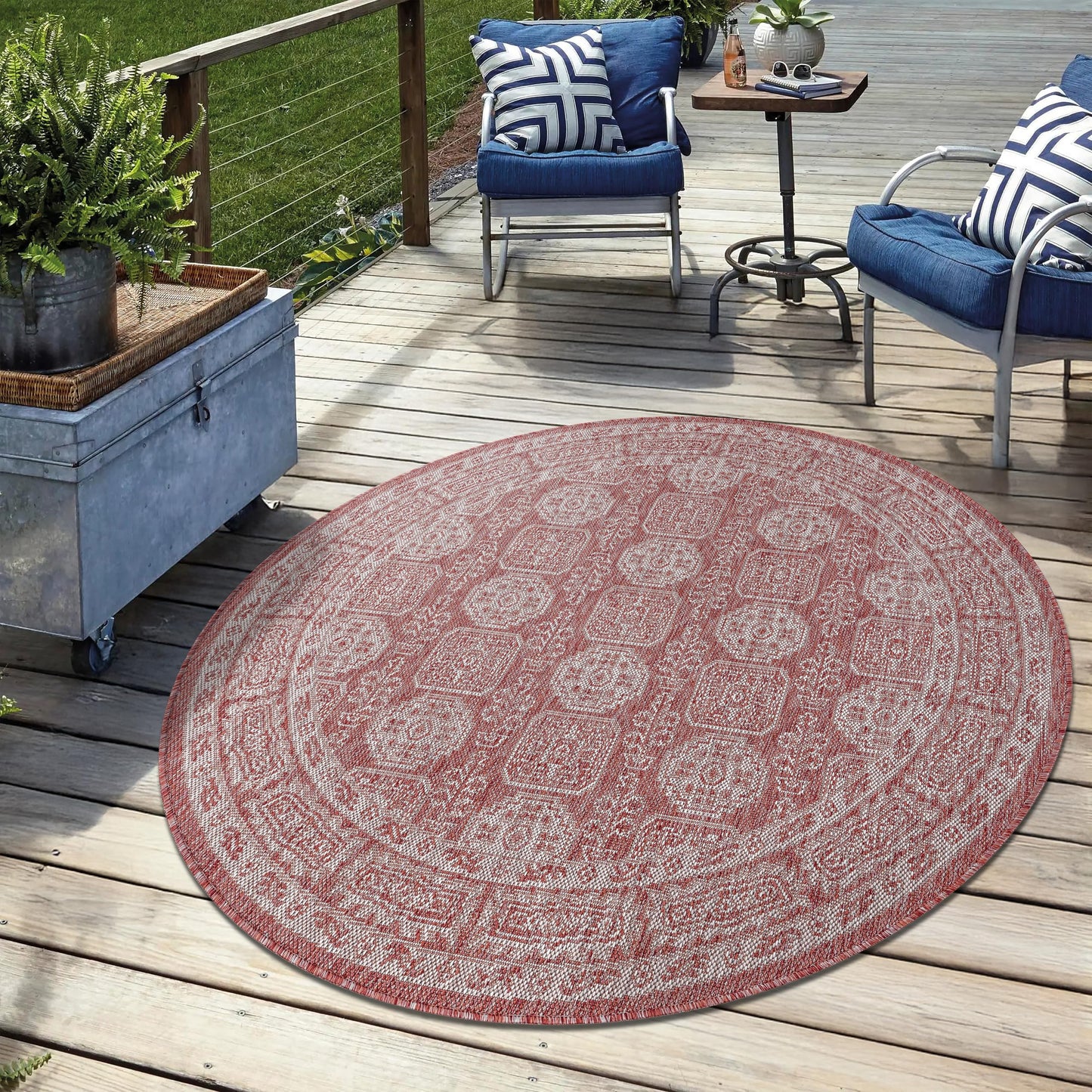 Anatolian medallion outdoor rug under round patio dining table