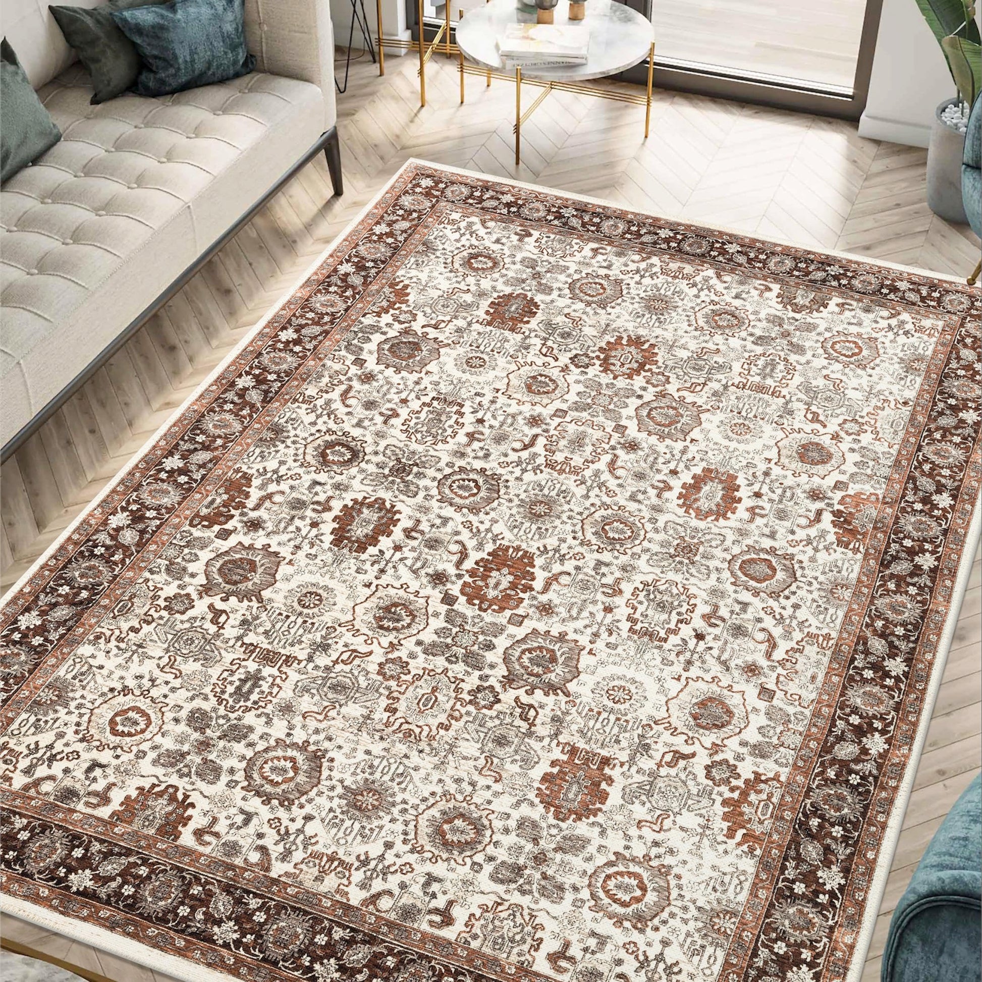 Ivory Sultanabad rug styled in a designer warm-traditional living room