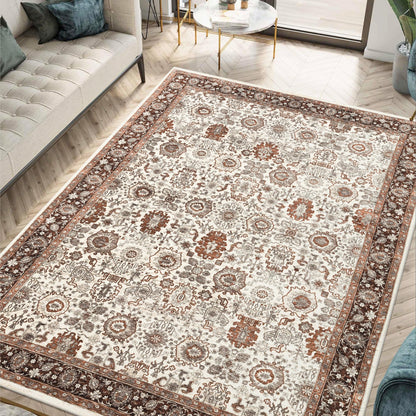 Ivory Sultanabad rug styled in a designer warm-traditional living room