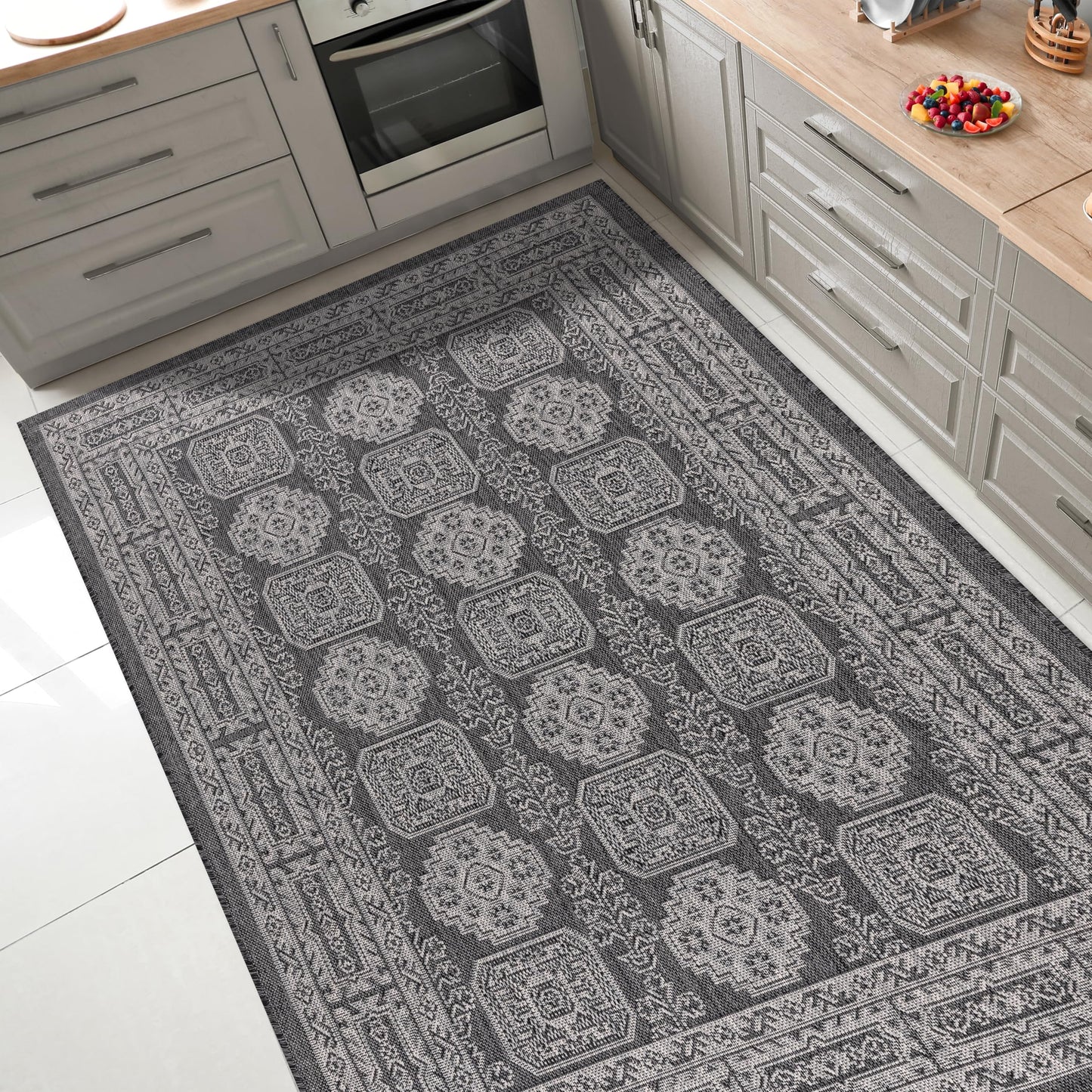 Anatolian medallion outdoor rug under round patio dining table