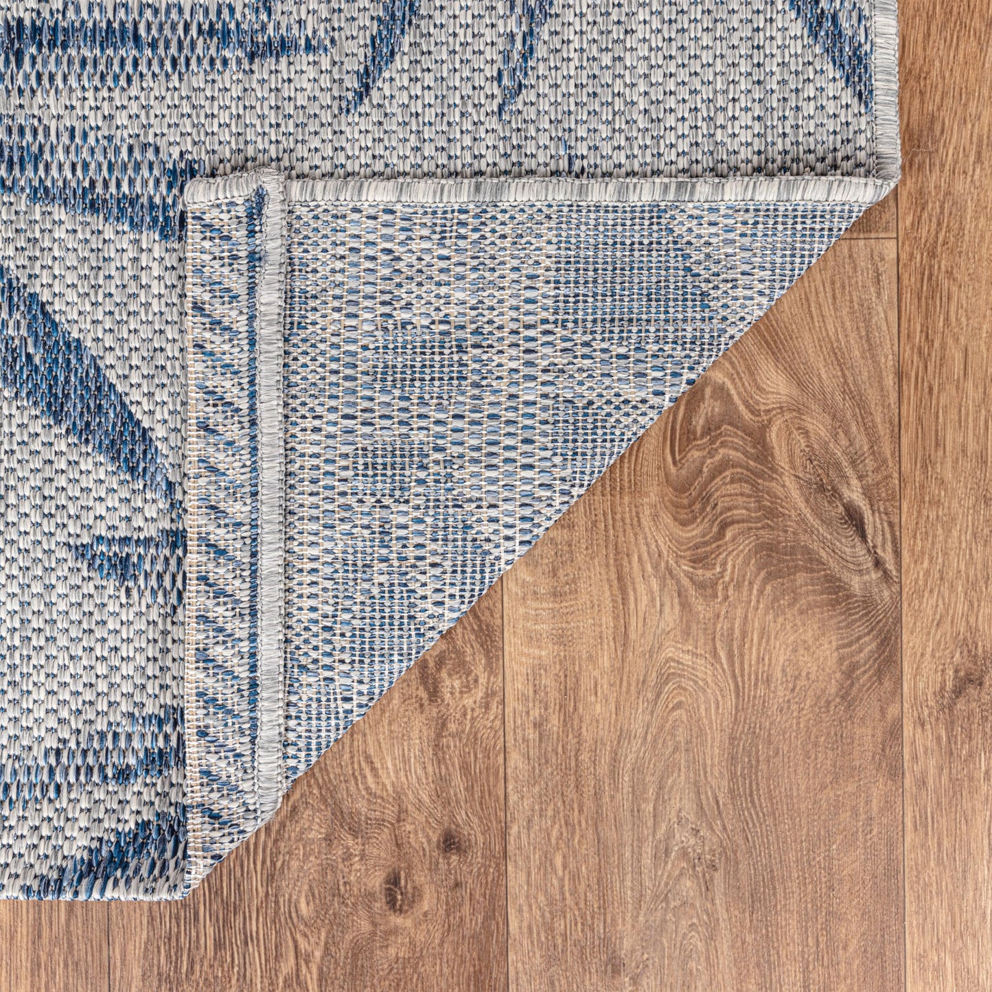 Tropical jungle weatherproof rug beside swimming pool