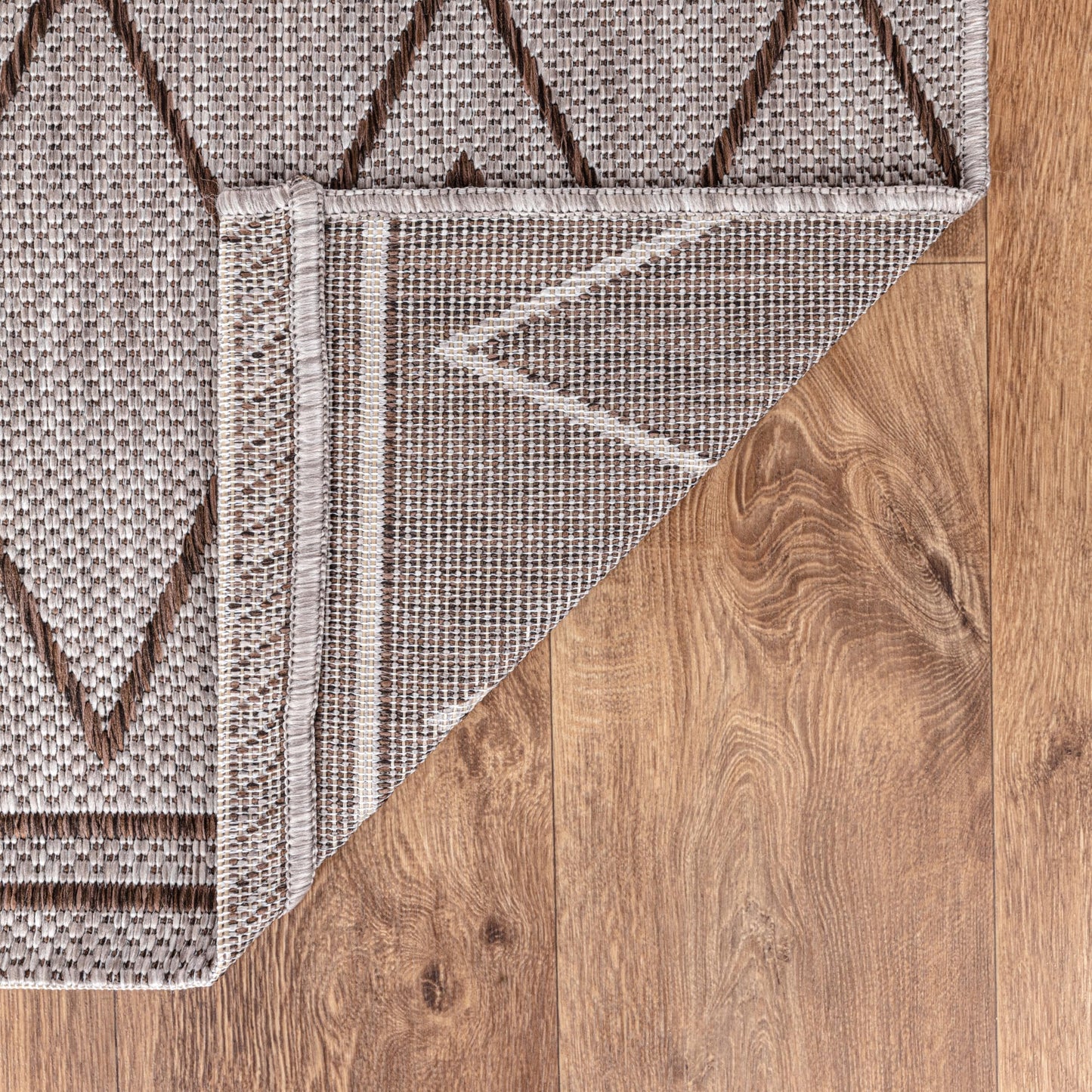 Berber diamond weatherproof rug beside swimming pool