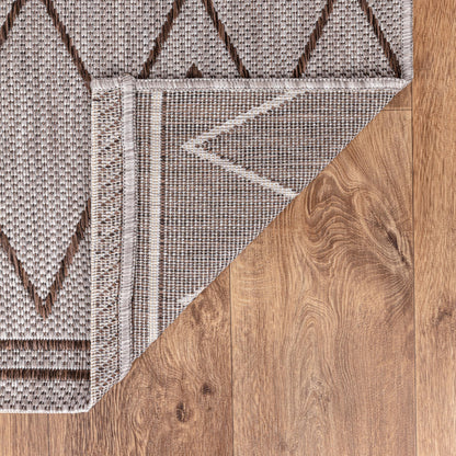 Berber diamond weatherproof rug beside swimming pool