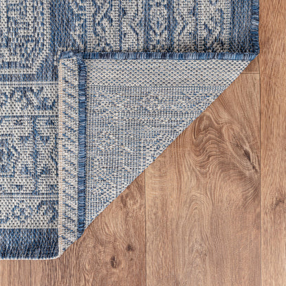 Anatolian medallion weatherproof rug beside swimming pool
