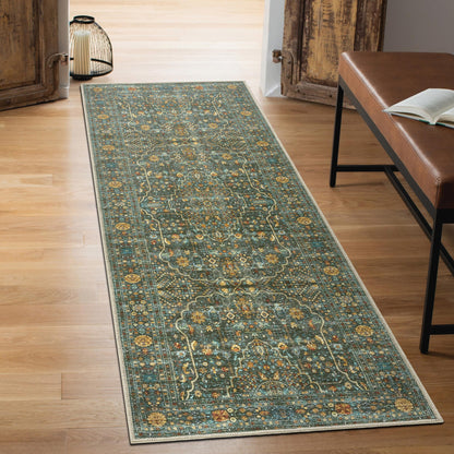 Forest green Esfahan rug styled in a luxurious living room
