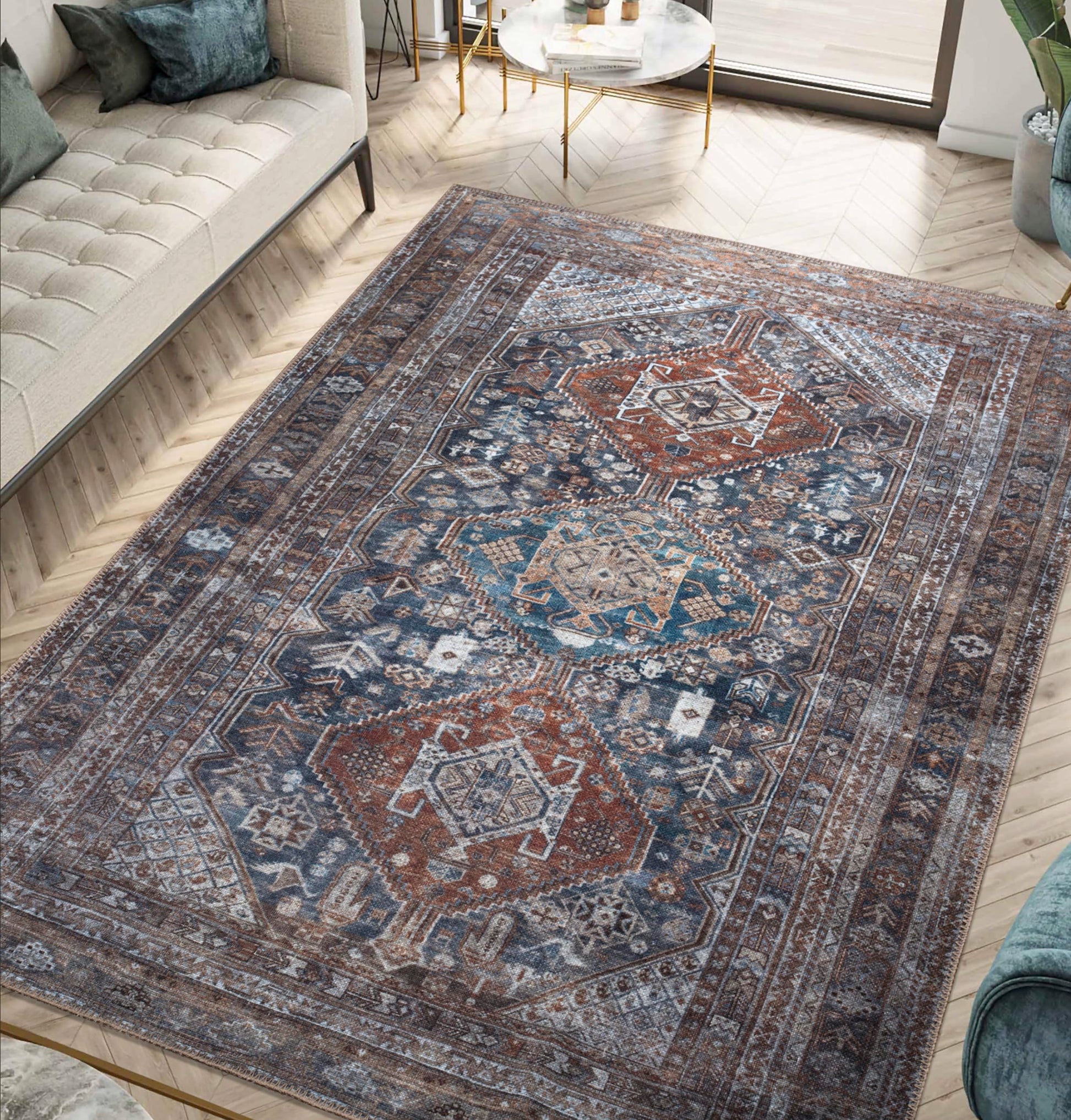 Coral Bakshaish rug styled in a richly-collected traditional living room