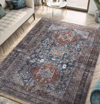 Coral Bakshaish rug styled in a richly-collected traditional living room