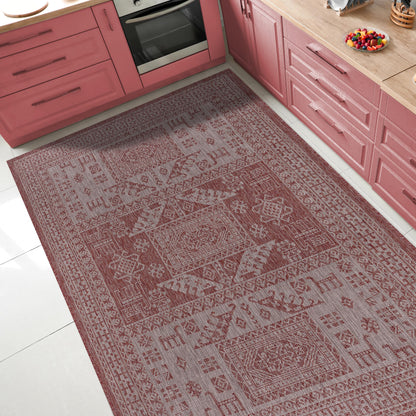 Tribal heritage outdoor rug under round patio dining table