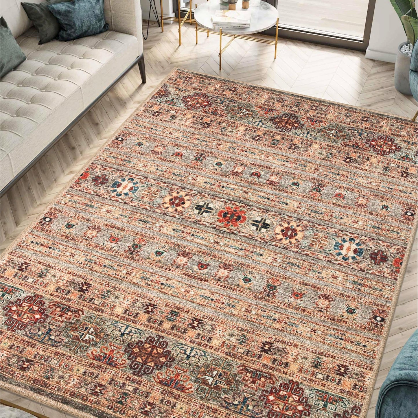 Burgundy tribal Afghan rug styled in a Mediterranean living room